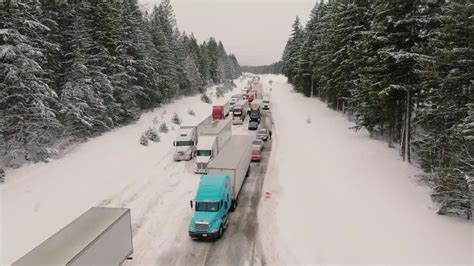 SNOQUALMIE, Wash. - The Washington State Department of Transportation said drivers ignoring chain requirements forced the closure of I-90 over Snoqualmie Pass on Saturday. At 4:00 p.m., WSDOT Snoqualmie sent out a tweet about the closure. They said that the eastbound lanes of I-90 are closed at milepost 34 near North Bend, and the westbound lanes are closed at milepost 106 near Ellensburg.. 