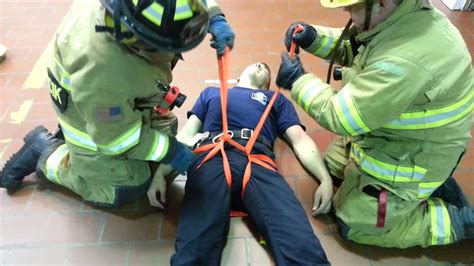 Webbing firefighter drag.  The building must have a second floor with stairwell access.  Usin...