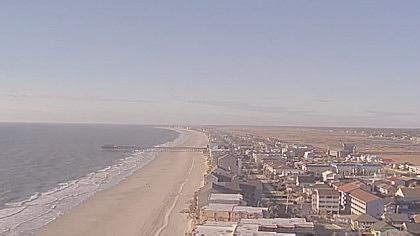 Get ready for some serious beach vibes from our Garden City Beach live cam!Kick back, relax, and soak in the South Carolina sunshine and its sandy awesomeness!. Garden City Beach is situated along the Atlantic Ocean, just south of Myrtle Beach, one of the most popular tourist destinations on the East Coast.The area is renowned for its beautiful sandy beaches, warm ocean waters, and a relaxed ...