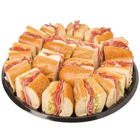 Wegmans sub sandwich trays. May 20, 2023 · Wegmans subs are substantial. Even the small size, priced at $5.49, can sometimes reach six inches long, if your sandwich maker is feeling generous. Meanwhile, the large, costing $14.99, can stretch well over a foot. At $8.99, the medium is often a smart move. 