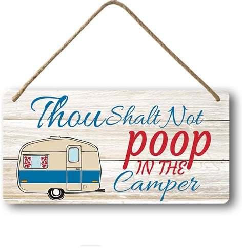 Welcome to our camper.  Pooping In.  One has "Happy Campers Welcom...