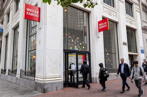 Wells Fargo fired four senior executives on Tuesday as pa