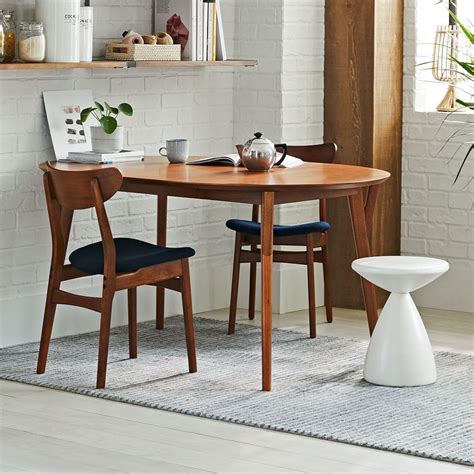 Mar 6, 2021 - Offering plenty of room to grow, our Mid-Century Rounded Expandable Dining Table adds extra seats when extended, making it perfect for family meals and dinner parties alike. Its sturdy contract-grade frame is crafted from sustainably. 