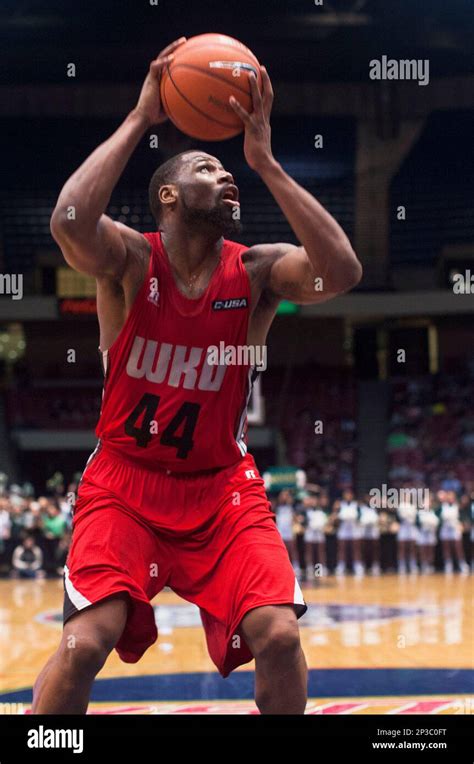 Western Kentucky forward George Fant walks to the locker room …