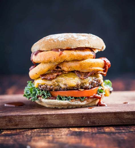 Western burger. INGREDIENTS · 4 Holten's Chop House Steak Burgers · 4 slices of pepper jack cheese · 1 cup shoestring fried onions · 2 tablespoons barbecue sauce &m... 