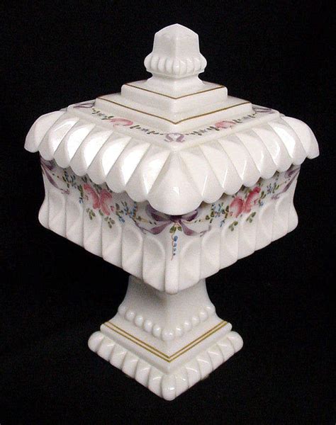Shop coastalridge's closet or find the perfect look from millions of stylists. Fast shipping and buyer protection. Description: Large Vintage Westmoreland Rudy Red Cranberry Flash and Clear Glass Covered Wedding Candy Dish Iridescent opalescent ruby finish Measurements 9-3/4” tall to the top of the lid and 5-1/2” wide No chips or scratches. Please note minor wear on finish along top of ....