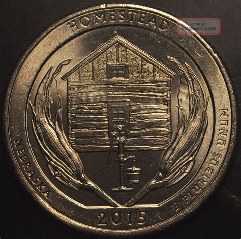 Description: Doubling shows on the underside of Washington's earlobe. Die Markers: Obverse: A small die gouge can be found between the upper I and C in AMERICA. Reverse: A short, vertical die gouge can be found just to the left of the top of the 2nd T in STATE. Submitted By: Leonard Schulfer. Cross References: None known. 2001-D 25¢ RI WDDO-002.. 