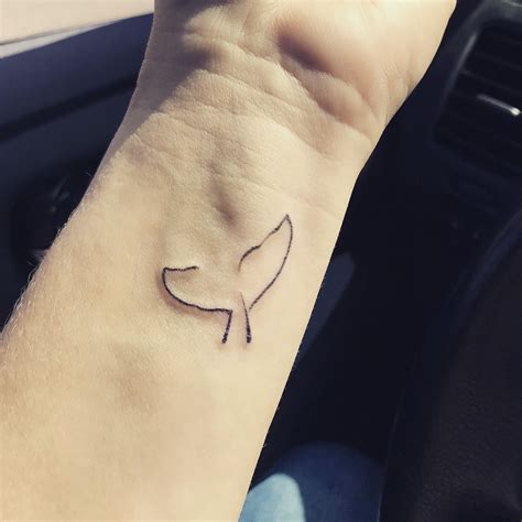 Whale tail tattoo with Mt Cook New Zealand by Matt Parkin Soular