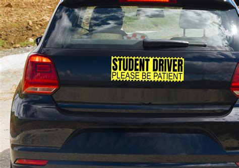 What's with all the student driver stickers?