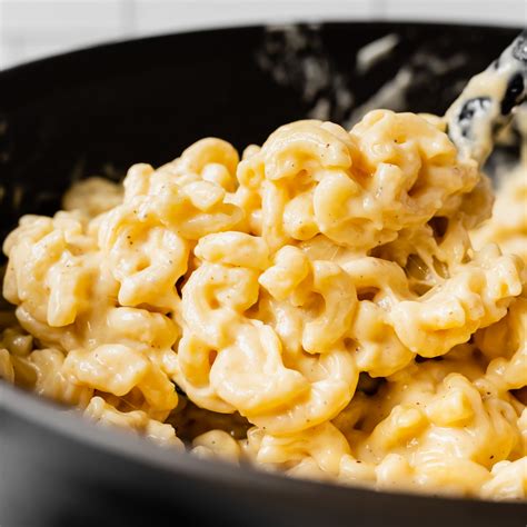 What 3 cheeses go well together for mac and cheese. Add the flour and whisk while it cooks until nutty in smell, about 2 to 3 minutes. Slowly pour in the milk and cream in while whisking and cook until it bubbles and thickens, about 5 minutes. Remove from heat. Reserve 1/2 cup of each cheese for the topping. Stir in the remaining cheese, salt, and pepper. 