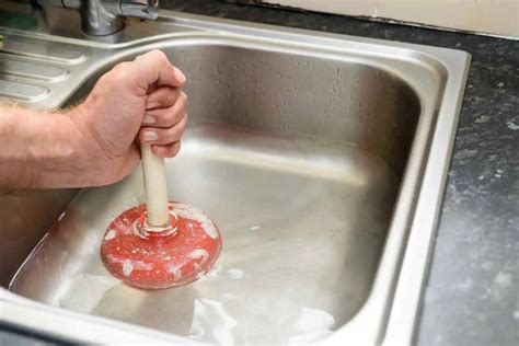 What Are the Causes of Water Coming Up the Drain in a Sink