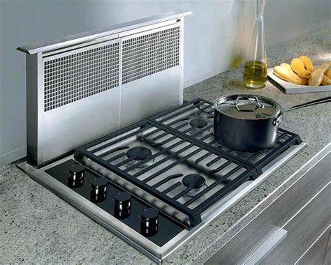 What about installing a cooktop downdraft vent/ducting in a slab?