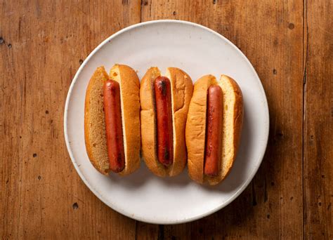 What are hotdogs made out of. Instructions. Arrange a rack in the middle of the oven and heat the oven to 400°F. Line a rimmed baking sheet with aluminum foil. Use a paring knife to cut a shallow (about 1/8-inch deep) slit lengthwise down 1 to 8 hot dogs. Arrange the hot dogs cut-side up in a single layer on the baking sheet, spacing them at least 1 … 