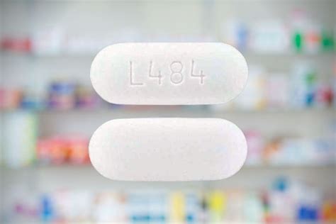 L484 is an imprint on an oblong, white pill. It is com