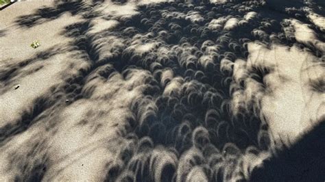 What are the beautiful, crescent-shaped shadows that occur during an eclipse?