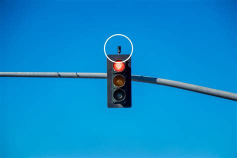 What are the lights placed above traffic signals?