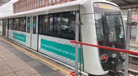 What are the new DLR trains that are under trial?