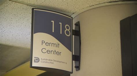 What are the operating hours of the Pass and Permit Office?