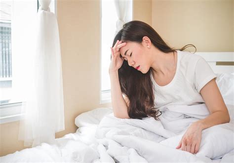 What causes dizziness when lying in bed
