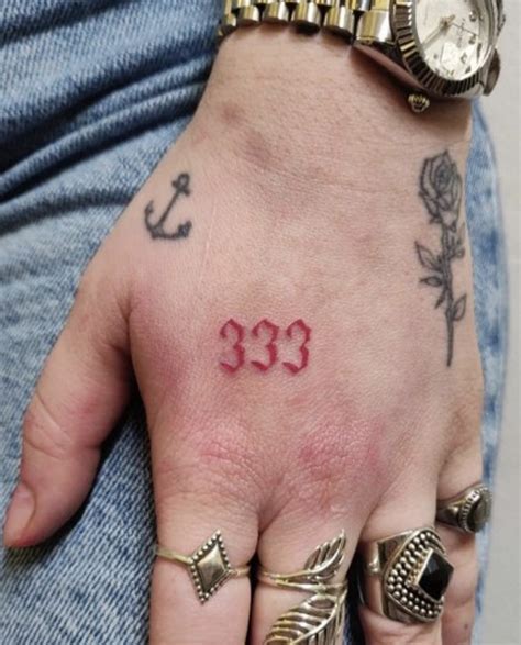 Uncover the spiritual depth of '333' tattoos in this in