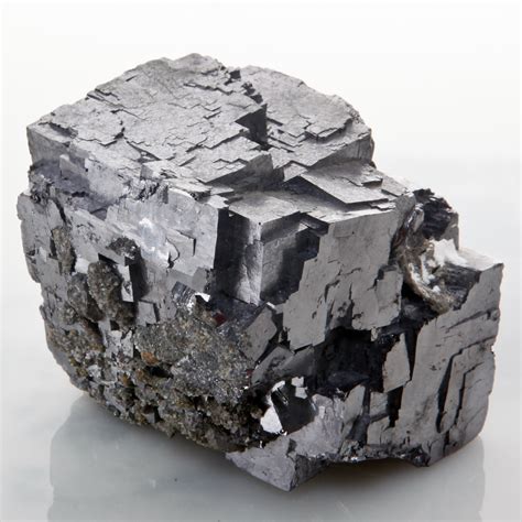 Galena, a mineral of both historical and geological significance, is a lead sulfide mineral with the chemical formula PbS. It stands out with its distinctive metallic luster and cubic crystal structure, often appearing as shiny, cubic or octahedral crystals.. 