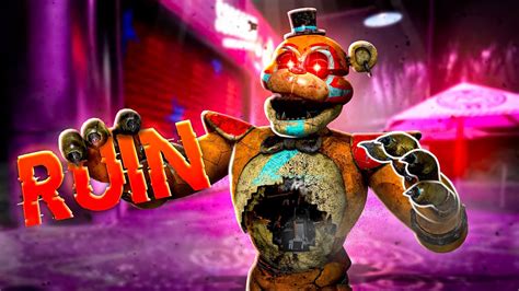 And in the teaser we saw a broken down Golden Glamrock freddy statue in the lobby. And in the game there are only 2 endings in which the pizza plex is ruined, the Fire ending in which the building is set on fire, but let’s be honest a fire would not flip a mini golf course on it’s side like an earthquake would, only burn it. and also in that ending we see a …. 