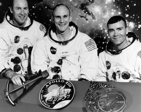 What happened to the original crew of apollo 13 and why were they bumped from the assignment