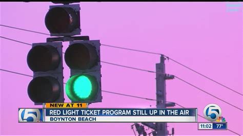 What happens if you get a red light ticket in Denver?