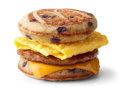 McDonald's Egg McMuffin® recipe features a freshly cracked Grade A egg placed on a toasted English Muffin topped with real butter, lean Canadian bacon, and melty American cheese. There are 310 calories in an Egg McMuffin® from McDonald’s. Enjoy it on its own or grab an Egg McMuffin® Meal with crispy Hash Browns and a small McCafé .... 