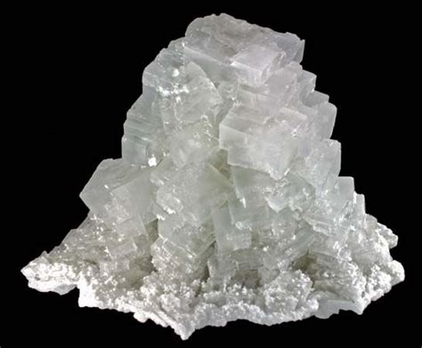 What is halite. Halite more commonly known as Rock salt is a mineral formed from sodium chloride. It's chemical formula is NaCl and this also includes other variations of salt such as common salt and table salt. Rock salt tends to be the industrial name used for Halite. It forms as isometric crystals and is typically colourless or white, but may also be other ... 