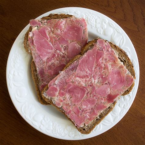 What is head cheese. It’s a European meat jelly made with the head of a pig or calf. However, despite its name – it resembles more of a large sausage or cold-cut terrine. Plus, it … 