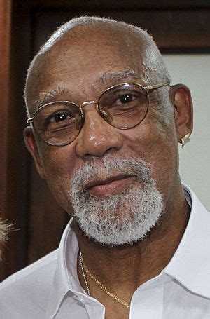 What is john carlos doing now