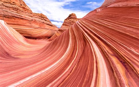 Sandstone, a sedimentary rock, is formed when grains of sand are compacted and cemented together over thousands or millions of years. The sand grains often are composed of the minerals quartz or feldspar that were worn off other rocks and ground down into pebbles. Sandstone varies in color depending on the color of the sand grains it …. 
