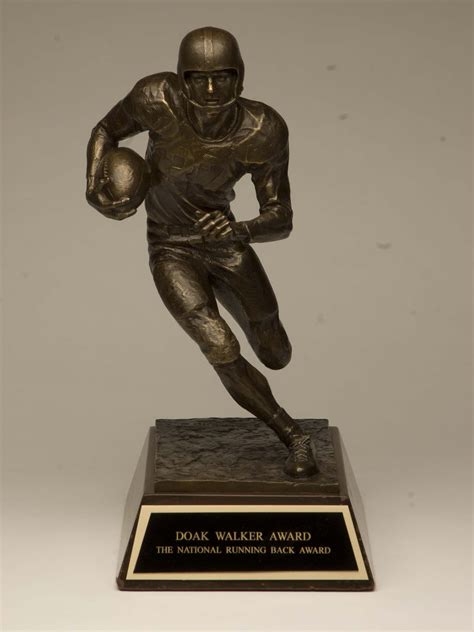 Walker, Ewell Doak, Jr. (1927–1998). Ewell Doak Walker, son of Ewell and Emma Walker, football player for Highland Park High School, Southern Methodist University and the Detroit Lions was born on January 1, 1927, in Dallas, Texas. Walker won the Heisman trophy in 1948 and was inducted into the Pro Football Hall of Fame in 1986..