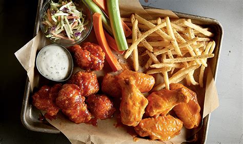 What time is buffalo wild wings open till. 1350 W. Bloomfield Road, Bloomington, IN 47403-2001. 40 mi. Open Now - Closes tomorrow at 12:00 AM. ORDER. Enjoy all Buffalo Wild Wings to you has to offer when you order delivery or pick it up yourself or stop by a location near you. Buffalo Wild Wings to you is the ultimate place to get together with your friends, watch sports, drink beer ... 