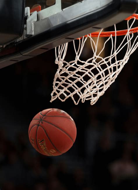 GCSE; AQA; Basketball - factfile Basketball scoring, rules and officials. Basketball is played by two teams of five players, with the aim of shooting a ball through the opposing team’s hoop .... 