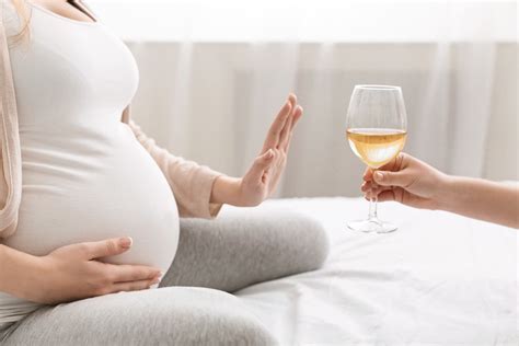 When should you stop drinking when pregnant