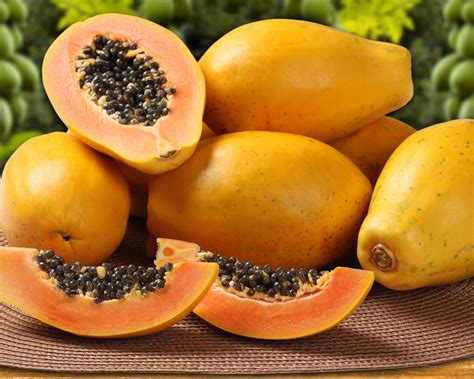 Where are papayas from. Papaya fruit is produced as either red fleshed fruit from hermaphrodite trees, which the industry label as papaya or larger yellow fleshed fruit from dioecious ... 