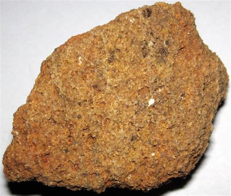 Fine-grained quartz sand from the St Peter formation (Ordovician sandstone) from Minnesota, USA. Sand from this formation is extensively used in hydraulic fracturing (fracking). Width of view 7 mm. Quartz is the most important sand-forming mineral because it is resistant to both physical and chemical weathering.. 