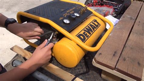 Where is the Reset Button on a Dewalt Air Compressor