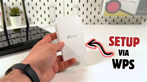 Where is the wps button on tp link extender re300.  Quick Installation Guide Range Extender RE3...