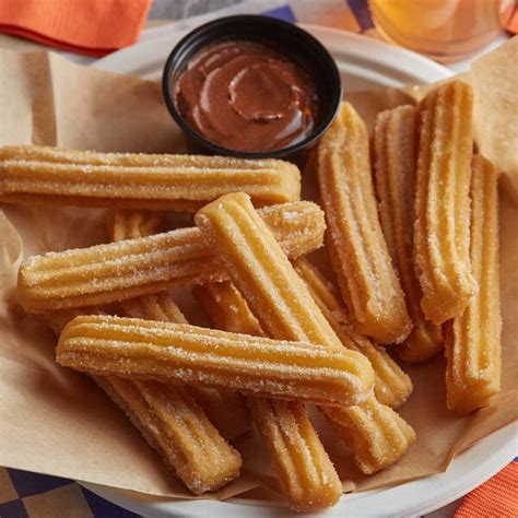 Where to buy churros. Directions. Place. Bake. Roll. Enjoy!Heat oven to 400degF.Place churro bites on ungreased baking sheet.Bake 5 to 6 minutes.Roll in cinnamon sugar mixture. Enjoy!Due to differences in all ovens, heating instructions may … 