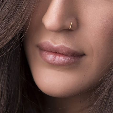 Where to buy nose rings. 14K Solid Gold Seamless Clicker Hinged Segment Hoop Ring Earring Conch Cartilage Helix Tragus Daith Rook Septum Nose Lip Piercing Jewelry. (2.4k) $39.59. $43.99 (10% off) FREE shipping. Adjustable Fake Nose Ring (No Piercing Required), Bunny Nose Ring, Non Piercing Nose Ring, Faux Nose Ring, Festival Body Jewelry. 