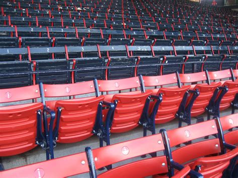 Which seats are covered at fenway park. Go right to section Grandstand 16 ». Section Grandstand 17 is tagged with: along the 1st base line. Seats here are tagged with: can be in the shade during a day game has an obstructed view of the scoreboard is a folding chair is near the home team dugout is on the aisle is under an overhang. nadiarenee. 