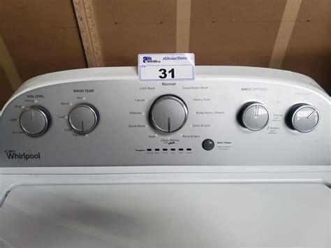 Whirlpool model wtw5000dw1. To add fabric softener to your Whirlpool washer Model WTW5000DW1, you have two options: 1. Using the Downy Ball® dispenser: - Pour a measured amount of Downy® liquid fabric softener into the Downy Ball® dispenser. - Pull the ring tightly to seal it. - Place the Downy Ball® dispenser on top of the load. 
