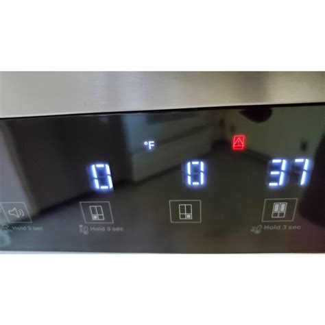 How to Reset Door Alarm on a Whirlpool Refrigerator. To do this: Find the lighting switch at the top of the fridge. Once you find it, push this down 3 individual times within roughly 5-10 seconds. This will reset the motherboard. Close the door and wait 3-5 minutes. If the alarm does not sound again, you’re good to go.. 