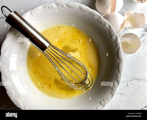 Whisked - whisk something to mix liquids, eggs, etc. into a stiff, light mass, using a fork or special tool synonym beat. Whisk the egg whites until stiff. Lightly whisk the eggs and then add them to the mixture. Whisk all the ingredients together.