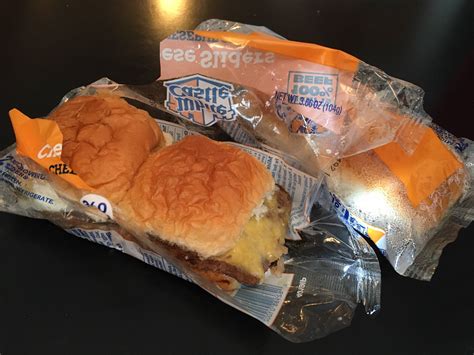 White castle frozen burgers. Remove frozen patties on parchment paper. Preheat oven to 450. Pour remaining beef broth (1 2/3 cup) into a baking sheet and spread minced onions over entire bottom of pan. Allow to sit for 5 – 10 minutes. Cut all dinner rolls in half to make buns. Place frozen beef on top of onion mixture. 