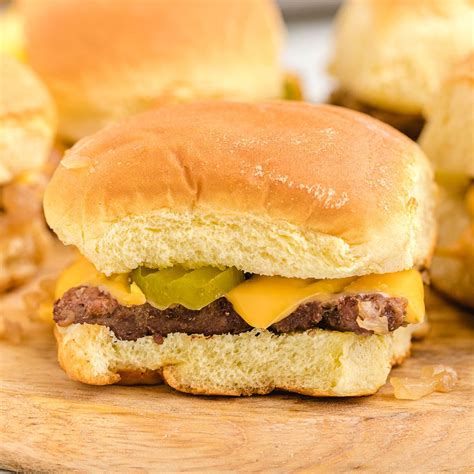 White castle recipe. 2. Heat your sliders according to package instructions. Cut into quarters. 3. In a large mixing bowl or pan, mix quartered sliders with the sazón, salt, pepper and cumin. 