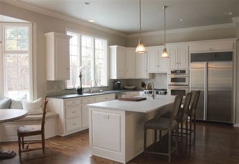 Sep 26, 2022 - White Dove: trim & kitchen cabinets Revere Pewter: interior walls Chelsea Gray: Doors Hale Navy: kitchen island. 